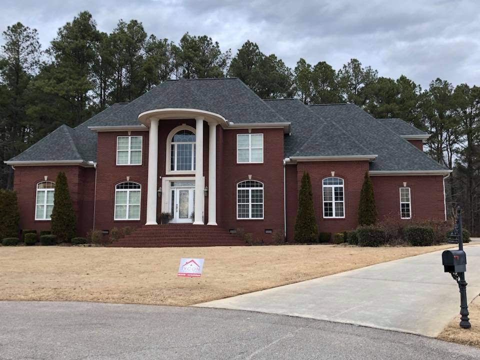 Slide of Tycon Roofing