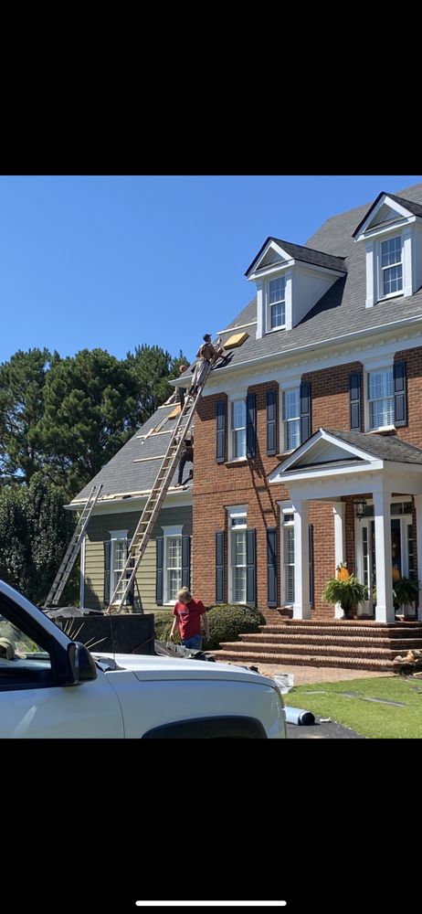 Slide of 4 Sons Roofing