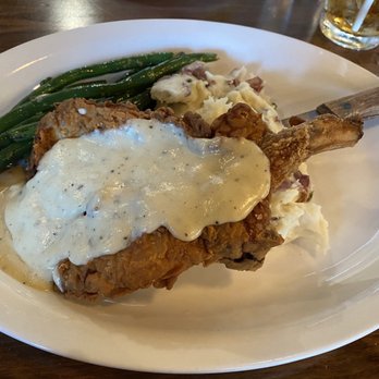 Texas Bistro - Chicken fried pork chop with garlic potatoes and fresh green beans - New American Near Me - New Braunfels, Texas Texas Bistro - Chicken fried pork chop with garlic potatoes and fresh green beans - New American Near Me - New Braunfels, Texas