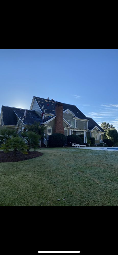 Slide of 4 Sons Roofing