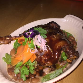 Mallard Cottage - Duck leg confit, pinto beans, braised trotters, turnip greens, beer jam, cilantro - Canadian (New) Near Me - St. John's, Newfoundland and Labrador Mallard Cottage - Duck leg confit, pinto beans, braised trotters, turnip greens, beer jam, cilantro - Canadian (New) Near Me - St. John's, Newfoundland and Labrador