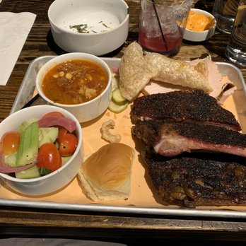 Home Team BBQ - My two meat combo platter with a half rack of ribs, smoked turkey- with Brunswick stew and Cucumber and tomato salad. - Barbeque Near Me - Aspen, Colorado