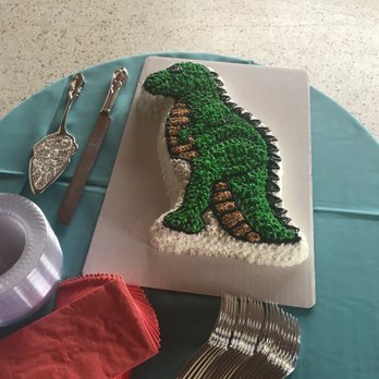Side Street Bakery - a cake with a dinosaur on it - Bakeries Near Me - Southport, North Carolina Side Street Bakery - a cake with a dinosaur on it - Bakeries Near Me - Southport, North Carolina