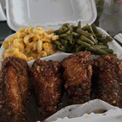 Sweet chili wings, mac & cheese, and green beans minus two wings and a couple bites of the sides.