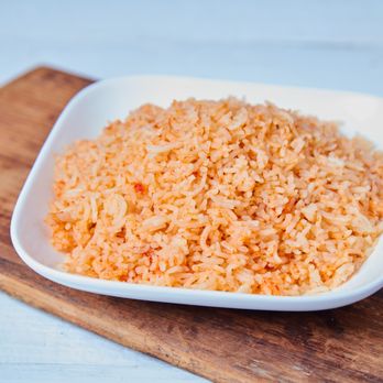 Nopalito Taqueria - a bowl of rice on a cutting board - Mexican Near Me - Los Gatos, California Nopalito Taqueria - a bowl of rice on a cutting board - Mexican Near Me - Los Gatos, California
