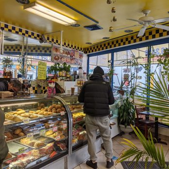 Las Tias Cafe Bakery - customers in a bakery - Coffee & Tea Near Me - Middle Village, New York Las Tias Cafe Bakery - customers in a bakery - Coffee & Tea Near Me - Middle Village, New York
