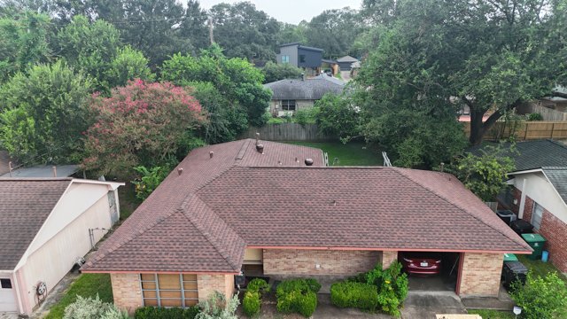 Slide of Newfield Roofing