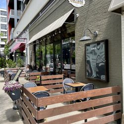 Sisters Thai - Outside / Exterior of restaurant with a cute little sidewalk "patio" seating area - nice place to people watch while enjoying a meal
