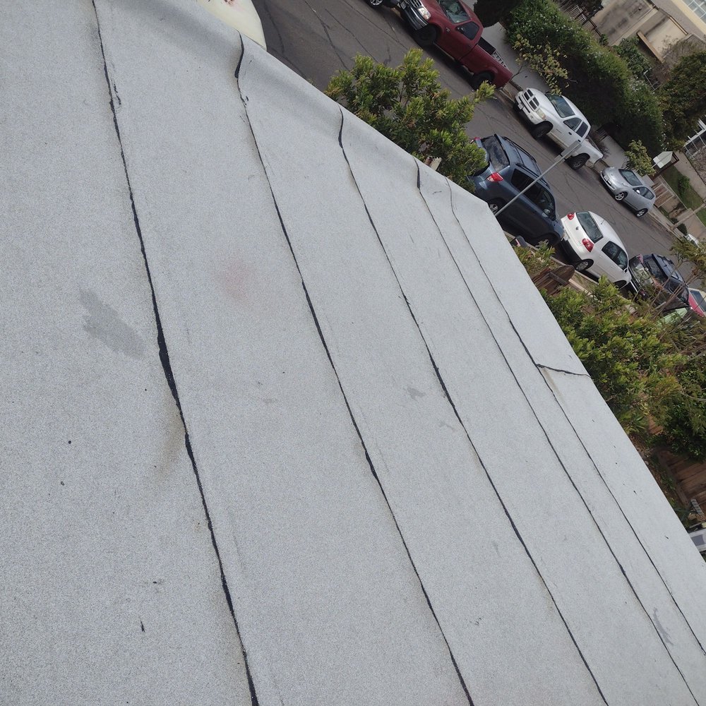 Slide of Mendez roofing