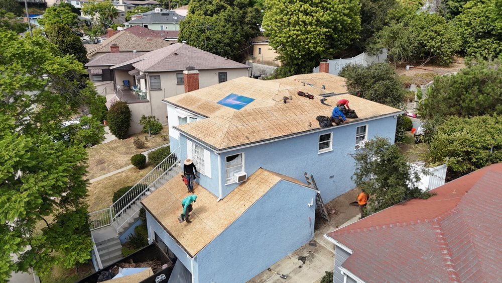 Slide of Meza Roofing Systems