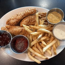 Chicken fingers and alll the sauces. Chicken fingers and alll the sauces.