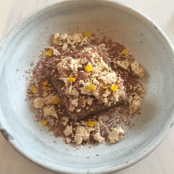 Tusk - Eggplant and Zucchini cake with fresh sheep's milk cheese and shaved dark chocolate!  Amazing - Middle Eastern Near Me - Portland, Oregon