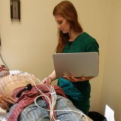 Desiree Butter, MD - Colonnades Family Medicine - Jessyka performing a digital EKG