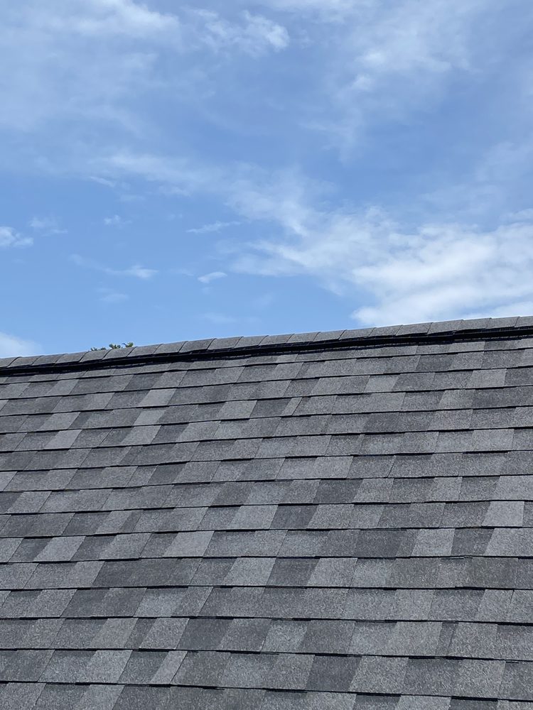 Slide of Ruebens Roofing