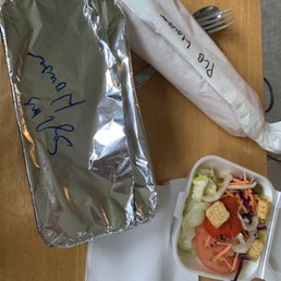 a salad in a plastic container a salad in a plastic container