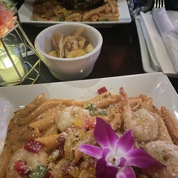 Drips Restaurant and Lounge - Shrimp rasta pasta, jerk chicken rasta pasta & complimentary plantain chips. - Lounges Near Me - Bronx, New York Drips Restaurant and Lounge - Shrimp rasta pasta, jerk chicken rasta pasta & complimentary plantain chips. - Lounges Near Me - Bronx, New York