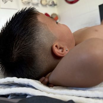 V Hair Styling & Nails - His skin fade is hands down the best he's ever got! She was very detail oriented, took her time, and it came out great! - Hair Salons Near Me - Honolulu, Hawaii