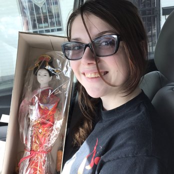 Dragon Spring - Happy daughter with her geisha doll - Sporting Goods Near Me - Reno, Nevada