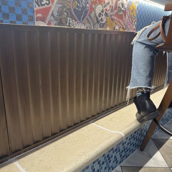 Johnny Radz - Authentic pool coping footrest along the bar - So Rad! - Pizza Near Me - Encinitas, California