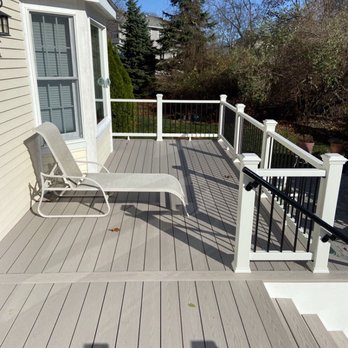 The Renaissance Handyman - Azek Harvest composite decking and Trex Essentials composite railing with aluminum balusters. - Handyman Near Me The Renaissance Handyman - Azek Harvest composite decking and Trex Essentials composite railing with aluminum balusters. - Handyman Near Me