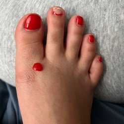 Boutique Nails and Spa - Gel pedicure. All I was doing was massage my foot and that toe felt funny and boom just fell off. Didn't pull it, it just fell