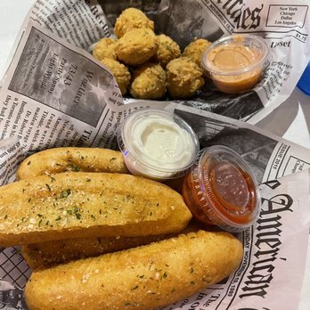 The Tangy Crab - Garlic breadsticks & crab bites ( not recommend garlic breadsticks, so much excessive oil) - Seafood Near Me - Lansing, Michigan The Tangy Crab - Garlic breadsticks & crab bites ( not recommend garlic breadsticks, so much excessive oil) - Seafood Near Me - Lansing, Michigan