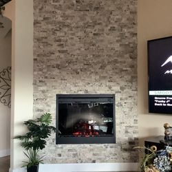 T & M Floors - Beautiful fireplace upgrade with stack stone