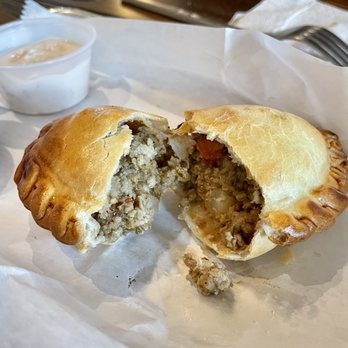 DelSur Empanadas - a half eaten meat pie - Empanadas Near Me - Minneapolis, Minnesota