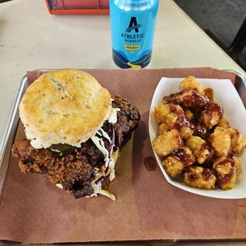 Mama Jo's Biscuits & BBQ - Nashville Hot Chicken on Biscuit, Tater Tots with Kansas City BBQ sauce and Athletic Run Wild IPA (NA) - Barbeque Near Me - Denver, Colorado Mama Jo's Biscuits & BBQ - Nashville Hot Chicken on Biscuit, Tater Tots with Kansas City BBQ sauce and Athletic Run Wild IPA (NA) - Barbeque Near Me - Denver, Colorado