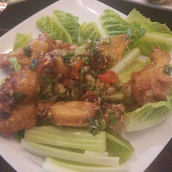 Basil Bistro - Chicken wings, with lots of peppery heat added to the house sauce - Vietnamese Near Me - Lynnwood, Washington