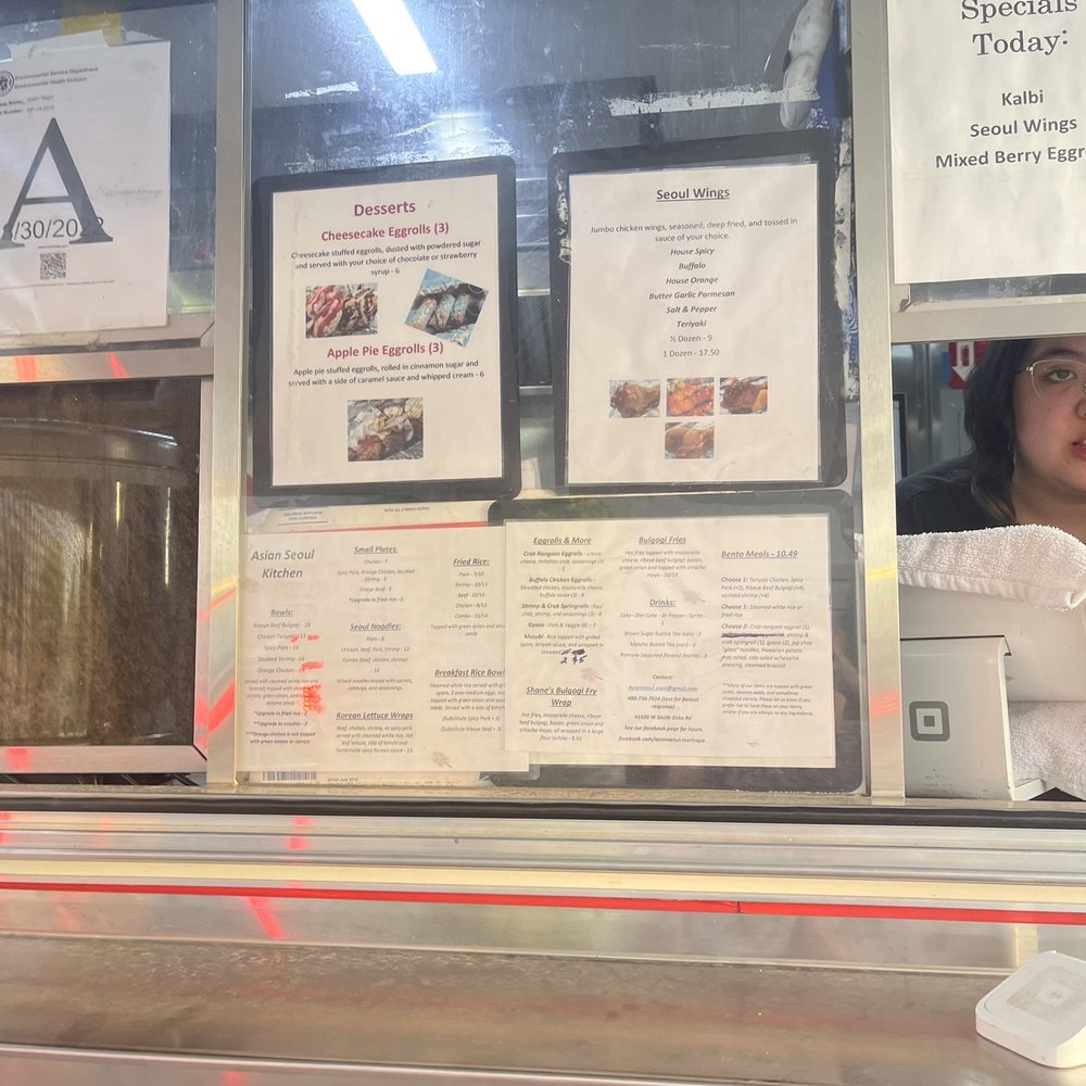 The oh so pleasant person who scolded me for wanting to to take a photo of her menu without parking my car. The oh so pleasant person who scolded me for wanting to to take a photo of her menu without parking my car.
