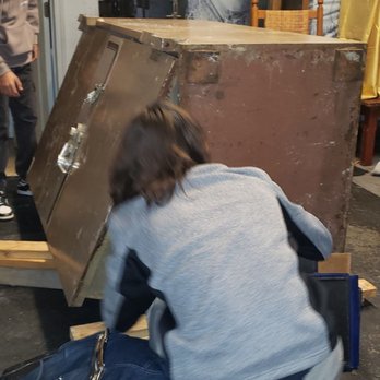 Santore & Son Lock & Safe - Louie is assisting getting contents out after opening the safe - Keys & Locksmiths Near Me Santore & Son Lock & Safe - Louie is assisting getting contents out after opening the safe - Keys & Locksmiths Near Me
