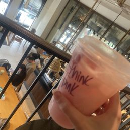 Pink drink and balcony seats