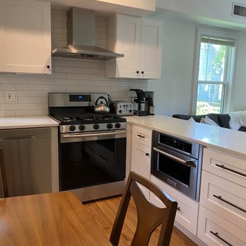 Idr Construction - Kitchen peninsula with built in microwave - Roofing Near Me