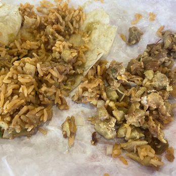 Fuego Cravings - The inside of the burrito. Hard, dark, old chicken. Where is the onion, cilantro and cheese? 13 for this!!!! - Mexican Near Me - Upland, California Fuego Cravings - The inside of the burrito. Hard, dark, old chicken. Where is the onion, cilantro and cheese? 13 for this!!!! - Mexican Near Me - Upland, California