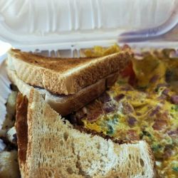 Southwestern Omelette with toast and home fried potatoes.
