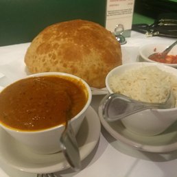 Poori bread and coconut chicken curry Poori bread and coconut chicken curry