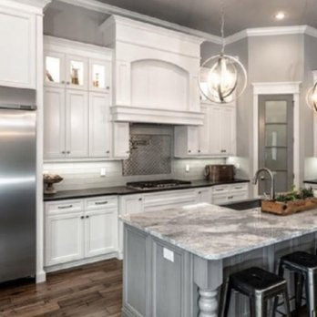 Right Choice Contractors - a kitchen with white cabinets and stainless steel appliances - General Contractors Near Me - Brooklyn Heights, Ohio Right Choice Contractors - a kitchen with white cabinets and stainless steel appliances - General Contractors Near Me - Brooklyn Heights, Ohio