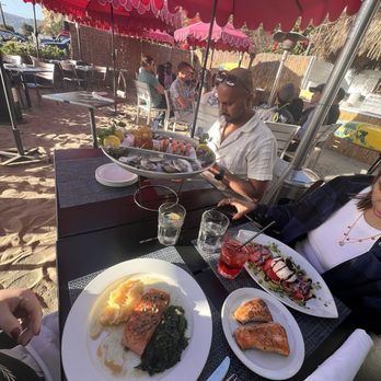 The Sunset Restaurant - Salmon with Mashed Potatoes and Spinach,  Seafood Platter, Burrata and Heirloom Tomato Salad - New American Near Me - Malibu, California