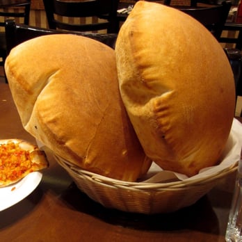 Paramount Middle Eastern Kitchen - Pita bread inflated with hot steam - comes free with every meal - Middle Eastern Near Me - Toronto, Ontario Paramount Middle Eastern Kitchen - Pita bread inflated with hot steam - comes free with every meal - Middle Eastern Near Me - Toronto, Ontario