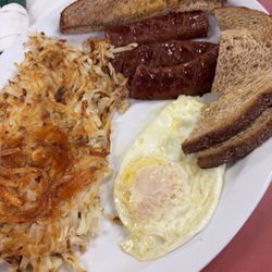San Andres Family Restaurant - Smoked sausage,hash brown, egg and toast. So good!