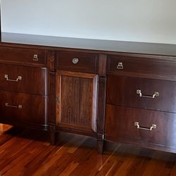 The Refinishing Company - Central door does not match the rest of the dresser.