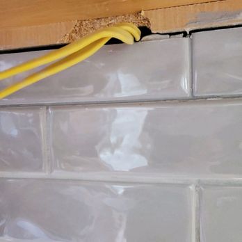 STL Design and Build - Wire and hole under cabinet for under cabinet lighting - General Contractors Near Me - Maryland Heights, Missouri