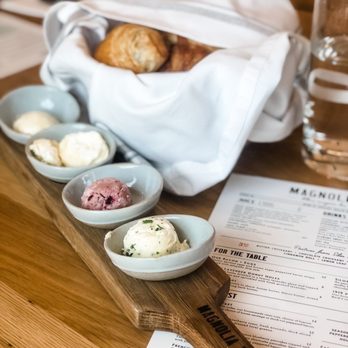 Magnolia Table - Silos Baking Co. Bread Basket with butter flight - Breakfast & Brunch Near Me - Waco, Texas Magnolia Table - Silos Baking Co. Bread Basket with butter flight - Breakfast & Brunch Near Me - Waco, Texas