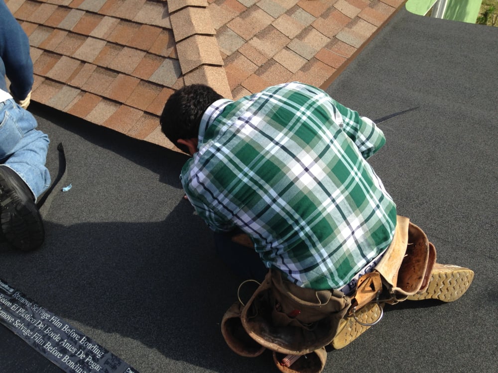 Slide of Hector's Roofing