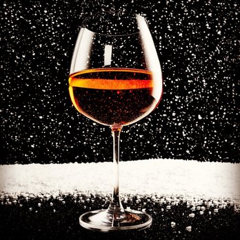 Bottle Knows Deliveries - a glass of wine in the snow - Food Delivery Services Near Me - Calgary, Alberta