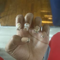 Danny Nail's & Spa - I know there was bad reviews about this place and I had to go check it out because I wanted to see if this was