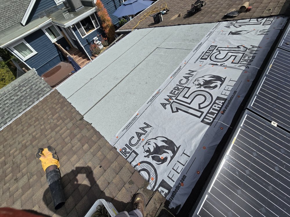 Slide of J&E Roofing Services