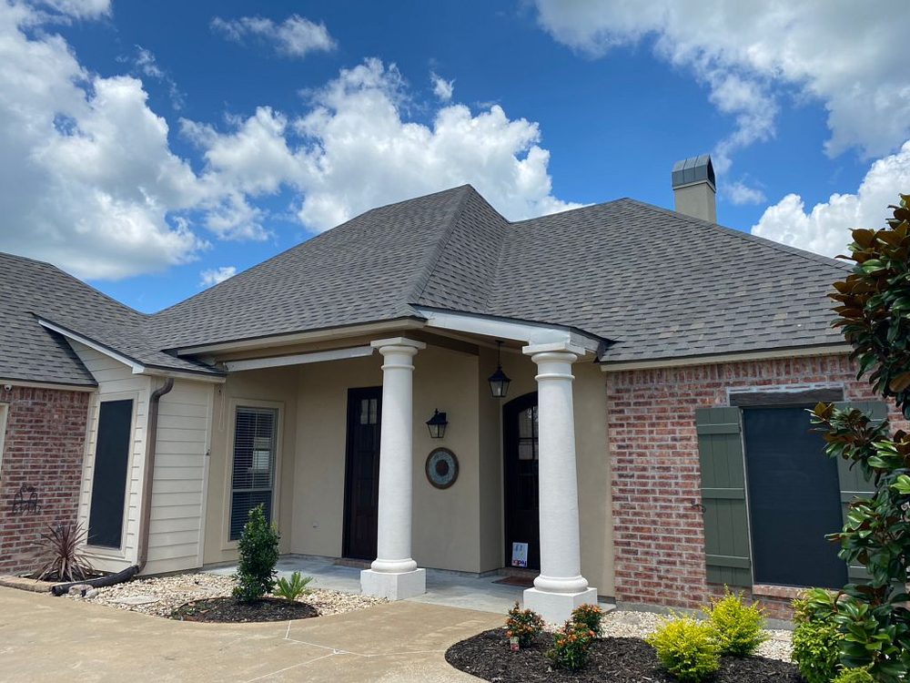 Slide of Pelican Roofing