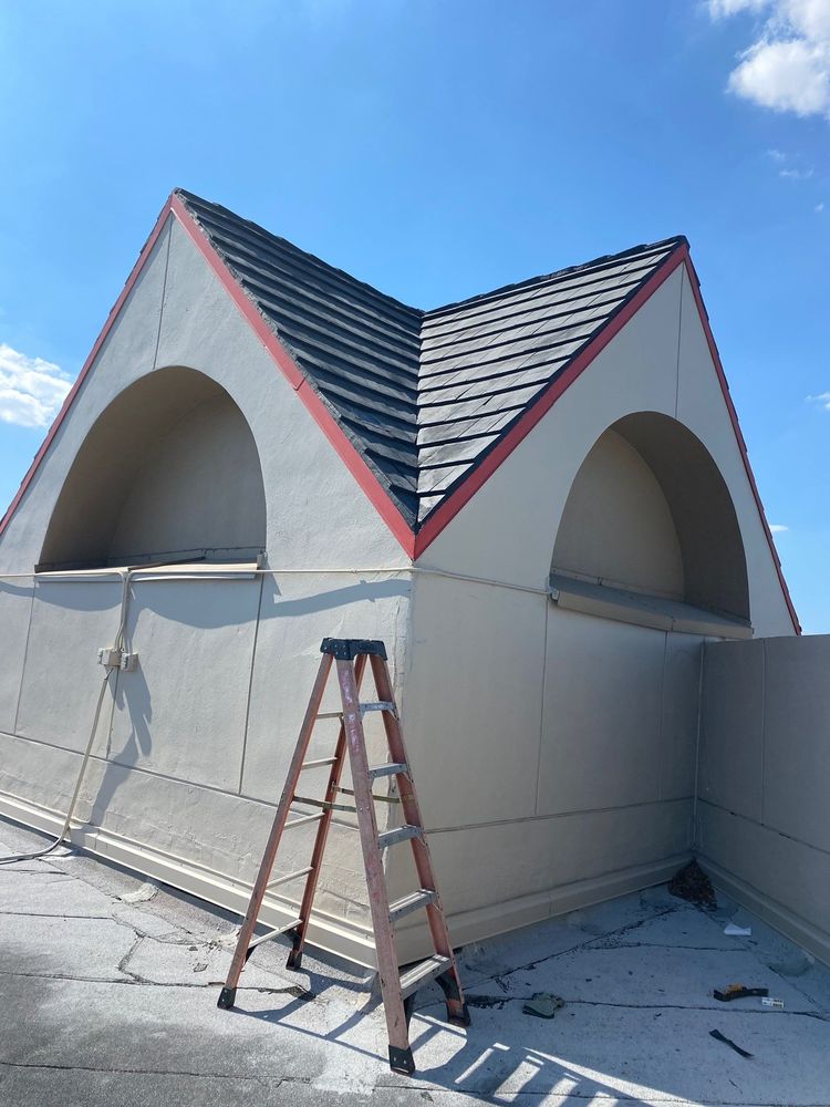 Slide of Tip Top Roofing